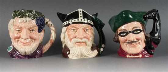 Appraisal: Three Royal Doulton china character jugs Bacchus D in H