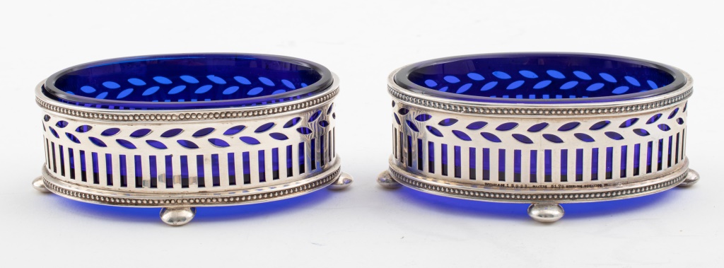 Appraisal: TIFFANY CO STERLING COBALT GLASS SALT CELLARS Tiffany Co sterling