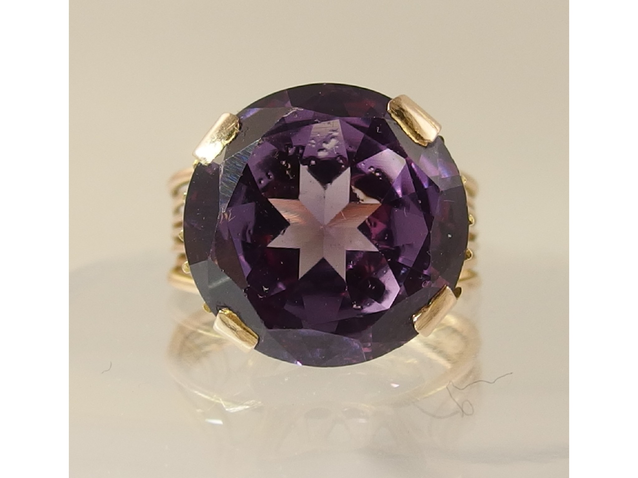 Appraisal: A ct continental ring set with a large colour change