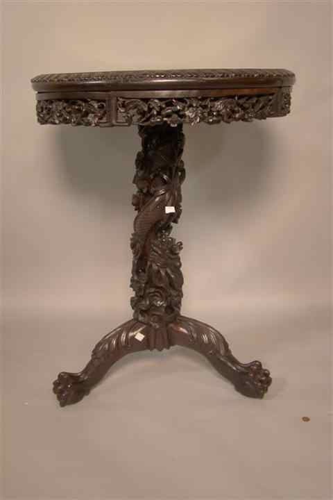 Appraisal: CHINESE CARVED HONG MU MARBLE TOP TRIPOD TABLE the circular