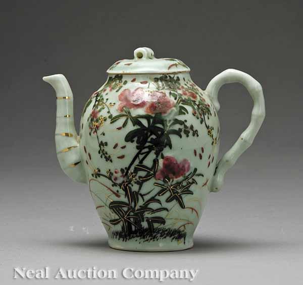 Appraisal: A Celadon Teapot th c enamel and gilt-decorated with flowering