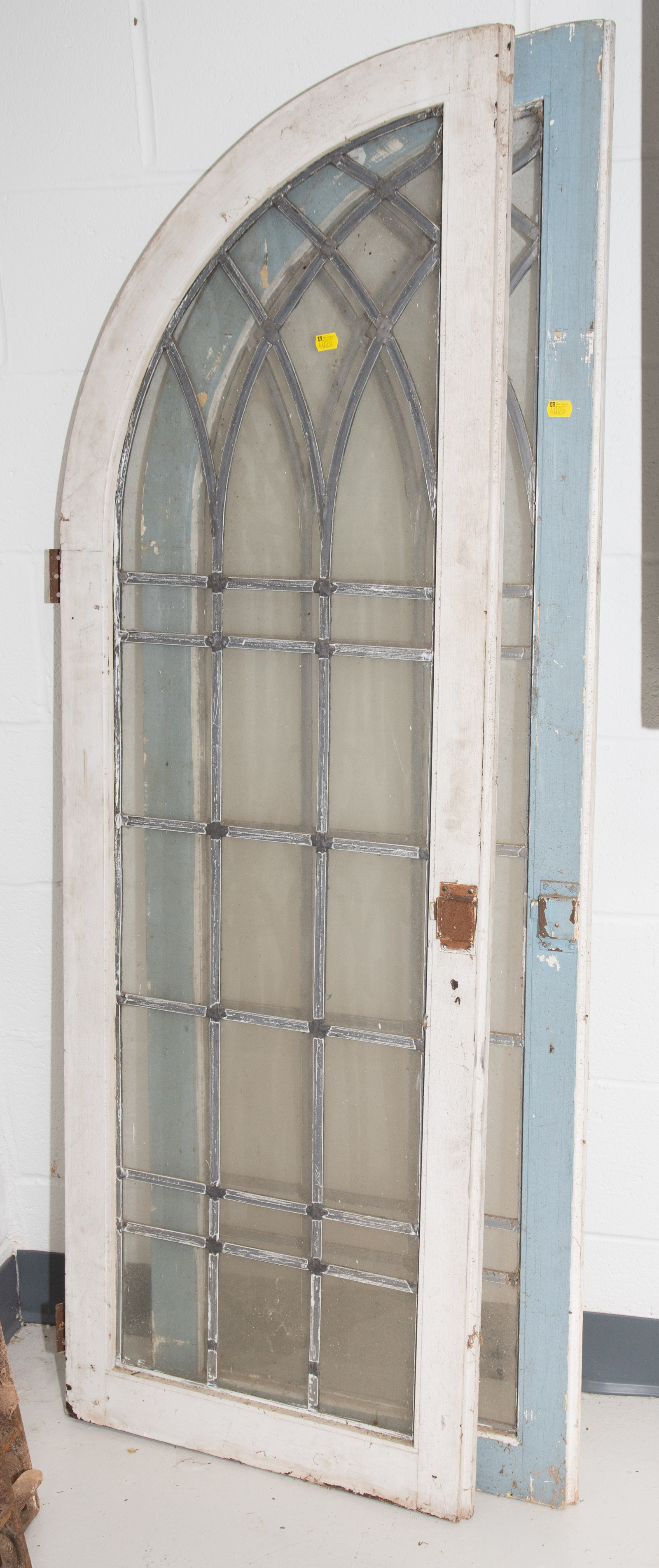 Appraisal: A PAIR OF GOTHIC STYLE LEADED GLASS WINDOWS st half