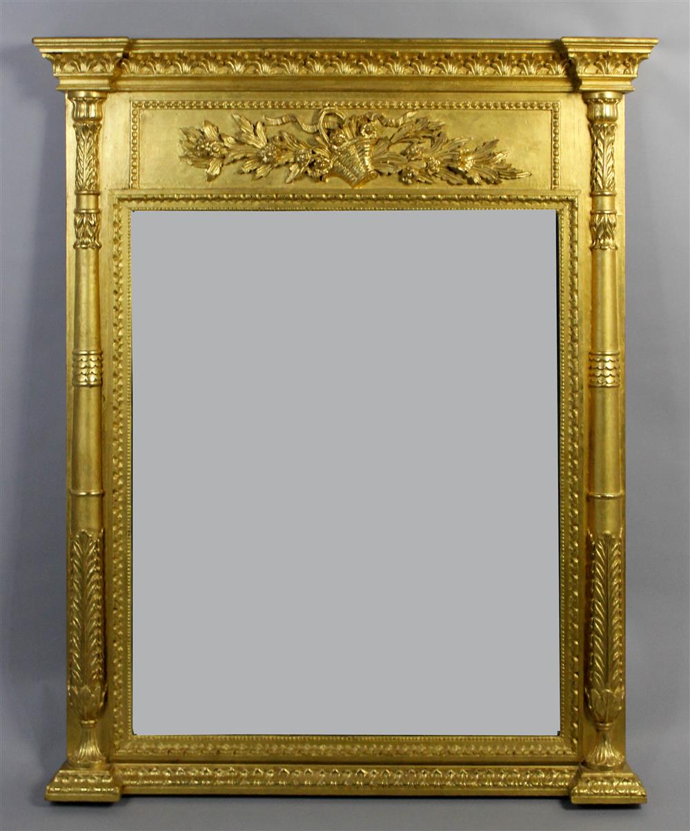 Appraisal: NEOCLASSICAL STYLE GOLD PAINTED WOOD MIRROR the rectangular mirror plate