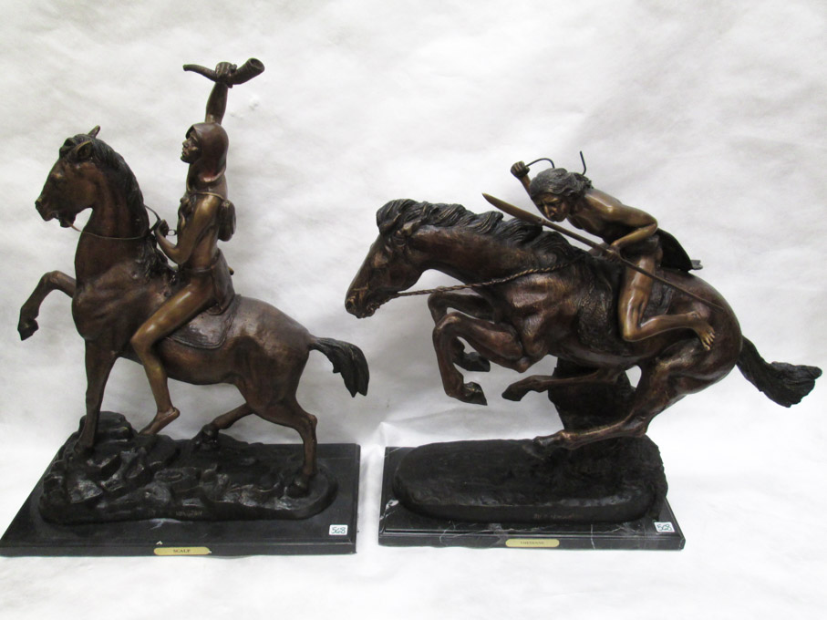 Appraisal: TWO PATINATED BRONZE SCULPTURES depicting American Indian figures on horseback