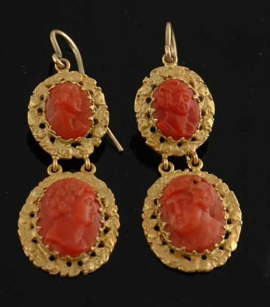 Appraisal: A pair of Antique coral cameo earrings Comprising a double