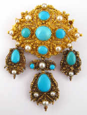 Appraisal: An antique carat gold turquoise and pearl filigree brooch with