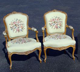 Appraisal: PAIR FRENCH STYLE NEEDLEPOINT OPEN ARM CHAIRS Carved frames fitted