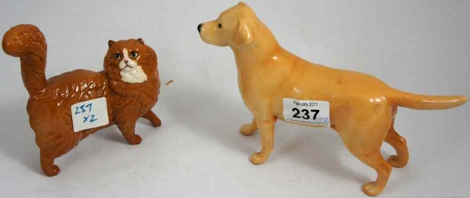 Appraisal: Royal Doulton Walking Cat DA and Beswick Golden Labrador Soloman