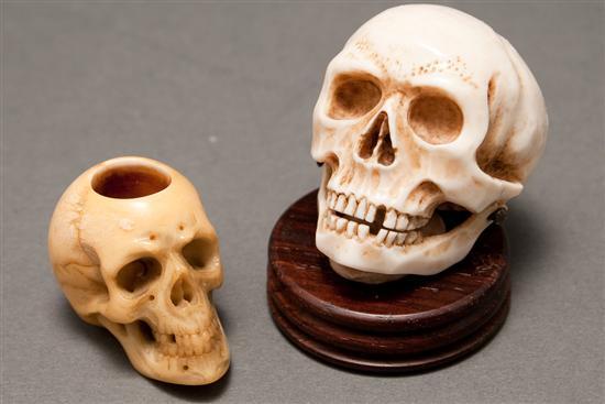 Appraisal: Continental carved ivory skull and a skull-form pipe bowl late