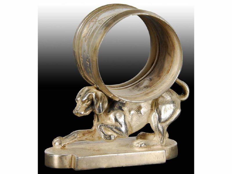 Appraisal: Crouching Hunting Dog Figural Napkin Ring On Back Description Marked