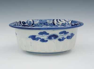 Appraisal: A Chinese Dragon Porcelain Bowl Footed bowl with gadrooned body