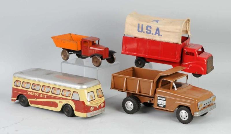 Appraisal: Lot of Pressed Steel Vehicle Toys Description American Includes Structo