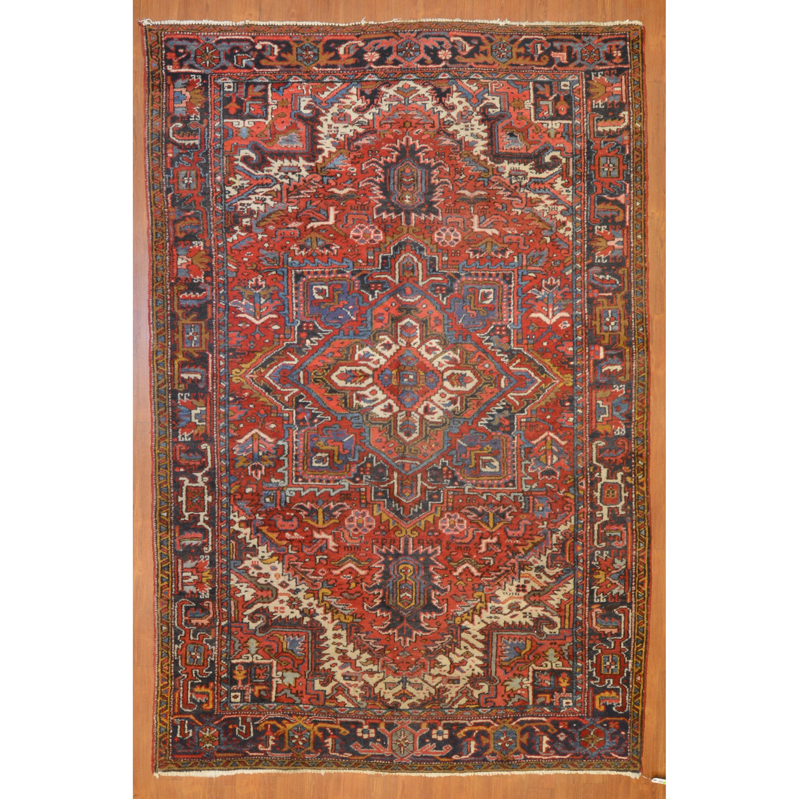 Appraisal: HERIZ RUG PERSIA X Third quarter- th century hand-knotted wool