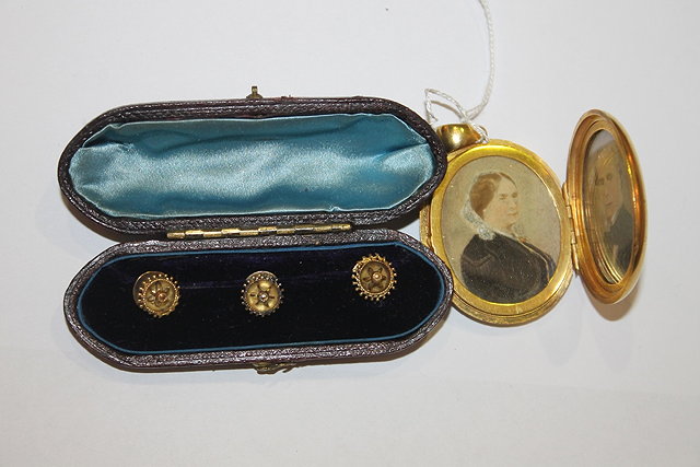 Appraisal: A VICTORIAN LOCKET of stylised form with fitted interior and