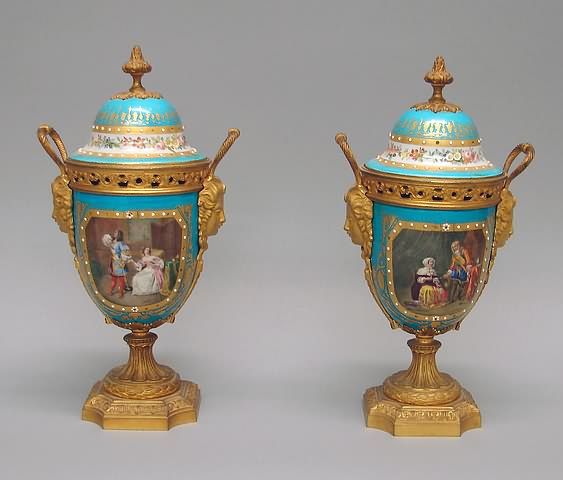 Appraisal: Ormolu-mounted blue celeste with twin mask heads and loop handles