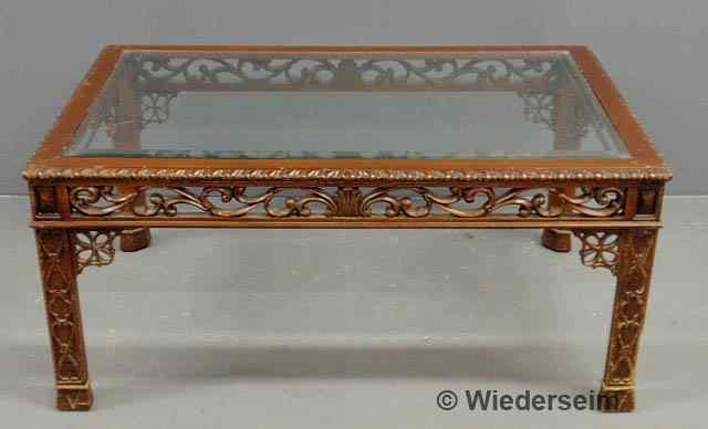 Appraisal: Chippendale style mahogany coffee table with a glass top h