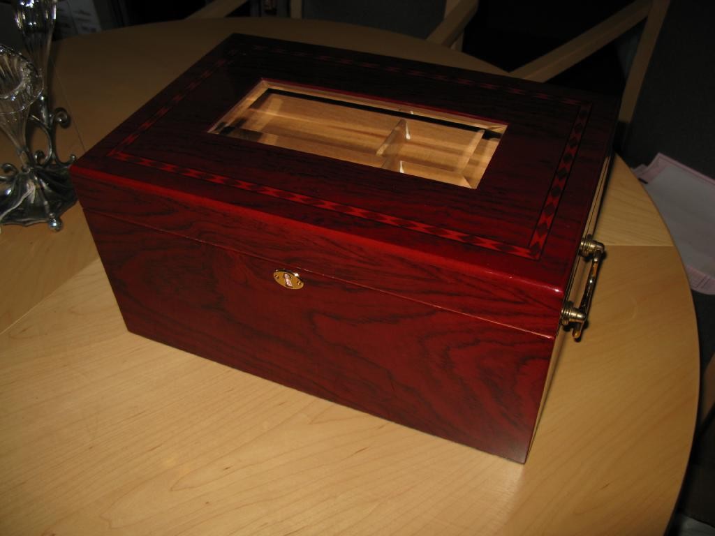 Appraisal: A modern humidor complete with all fittings carrying handles and