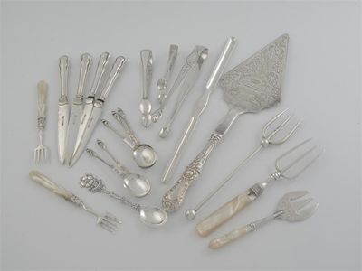 Appraisal: A mixed lot including two pairs of sugar tongs four