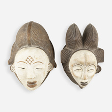 Appraisal: Punu artist MUKUDJ MASKS SET OF TWO Gabon c carved