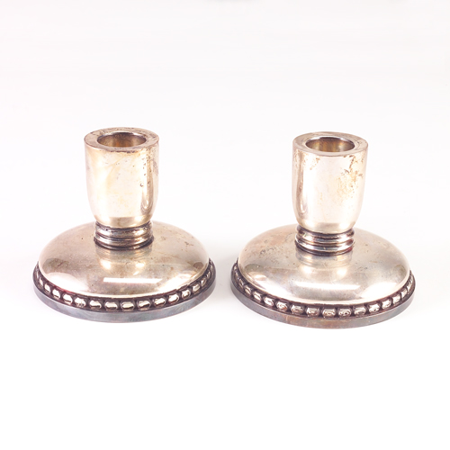 Appraisal: Pair of Georg Jensen low candlesticks t o