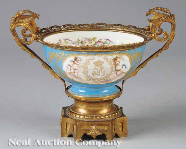 Appraisal: A Sevres Porcelain and Bronze-Mounted Bowl c having a blue