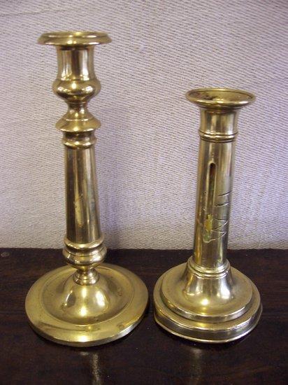 Appraisal: Two brass candlesticks th Century turned and on circular bases