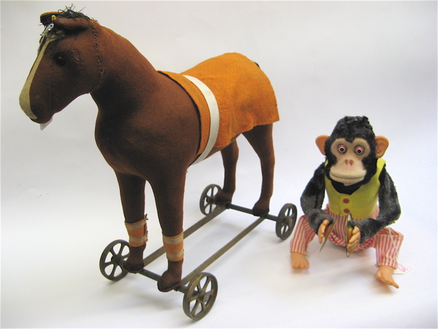 Appraisal: TWO CHILDS' TOYS brown felt push and pull horse on