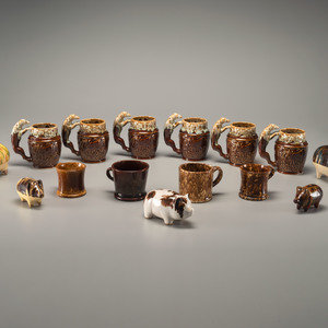 Appraisal: Fifteen Rockingham Glaze Mugs and Pig Banks th th Century