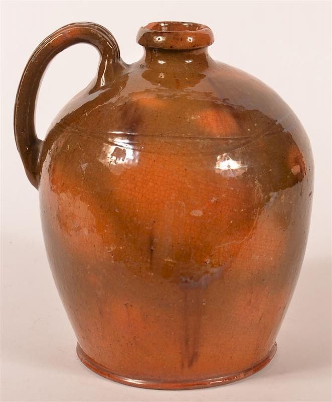 Appraisal: th C Strap Handle Multi-Glaze Redware Jug th C Strap