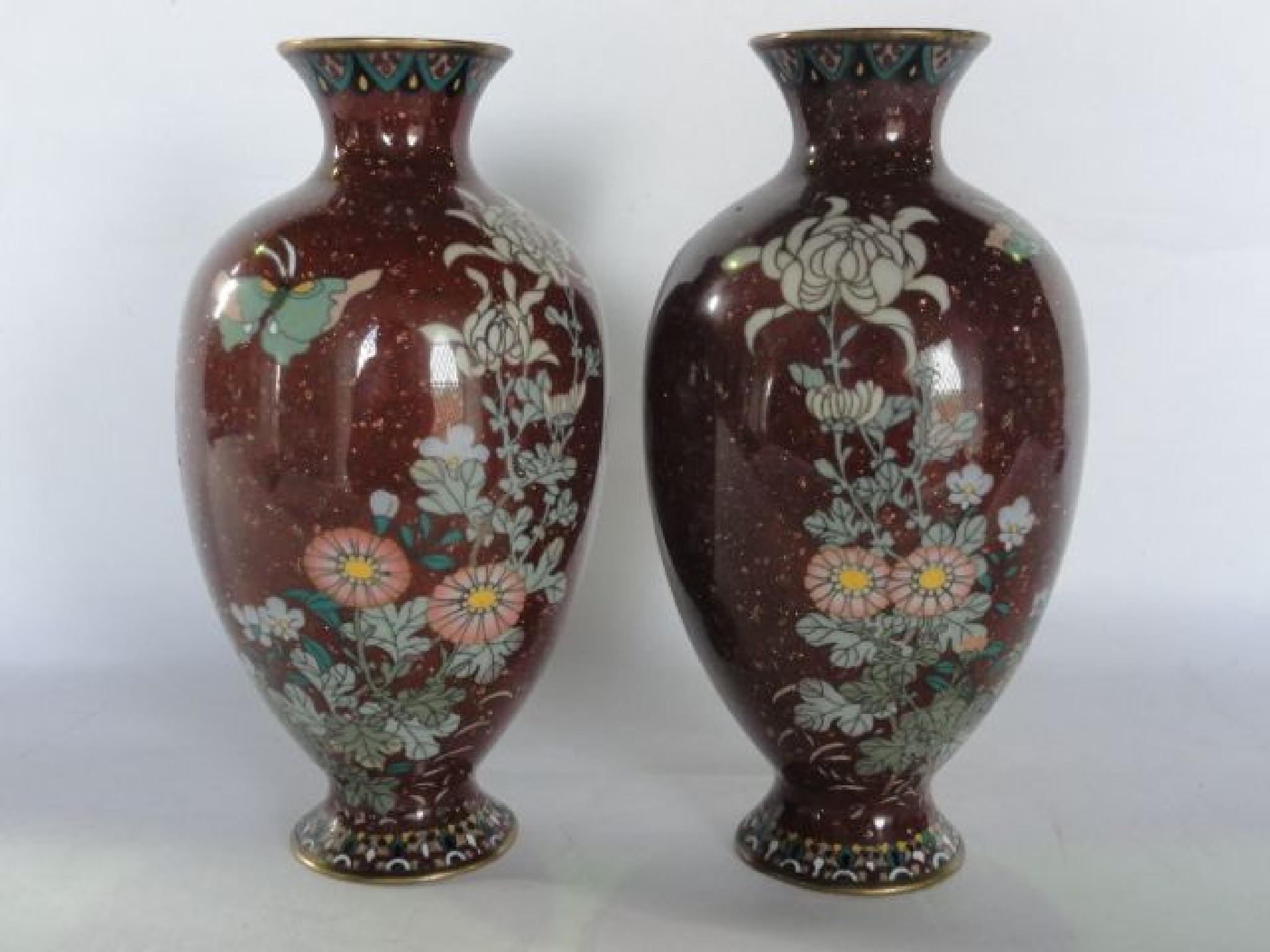 Appraisal: A pair of Chinese cloisonn enamel vases of baluster form