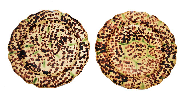 Appraisal: A PAIR OF WHIELDON SHAPED CIRCULAR DISHES with brown spot