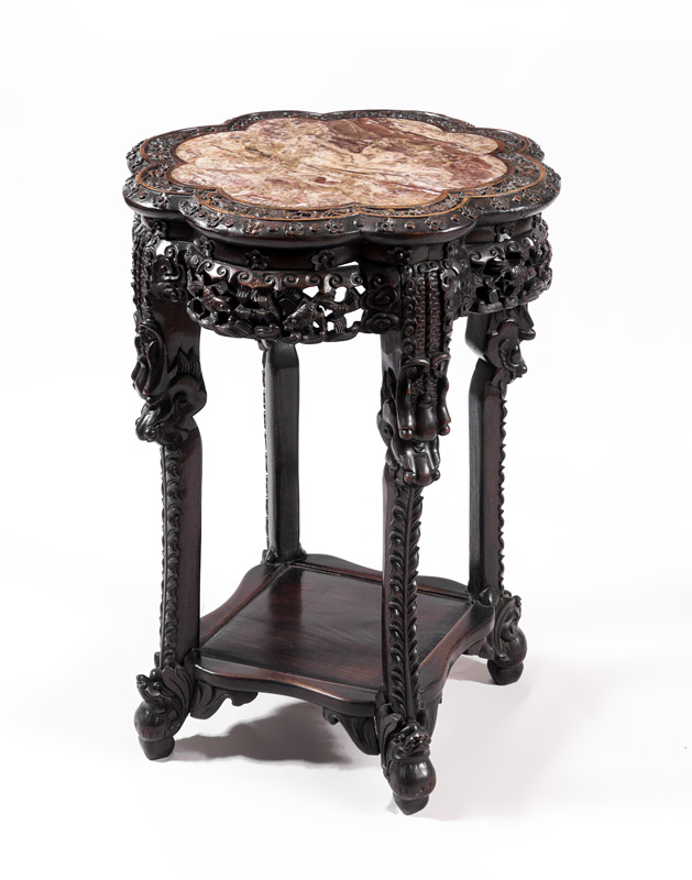 Appraisal: PROFUSELY CARVED CHINESE PLANT STAND Floriform inset marble top body