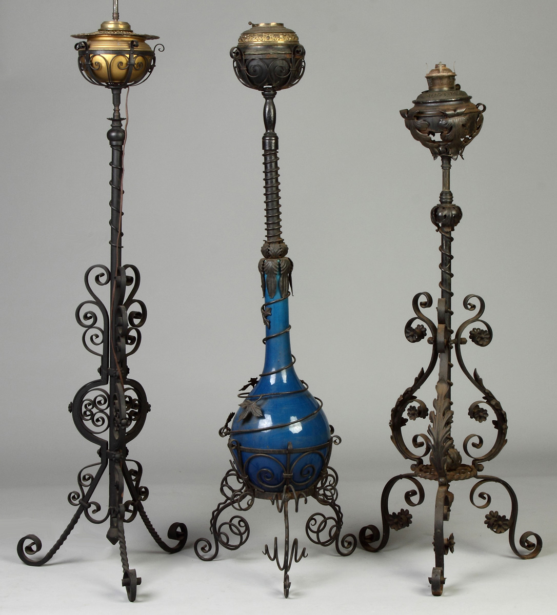 Appraisal: Three Wrought Iron Ceramic Floor Lamps