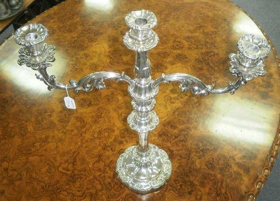 Appraisal: A two-branch three-light plated candelabrum with scrolling arms on a