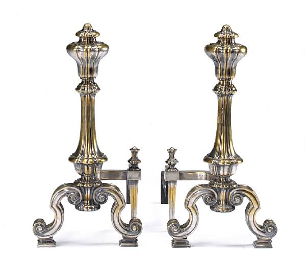 Appraisal: A pair of Baroque style silvered brass andirons first quarter