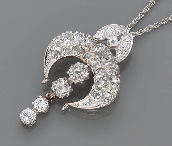 Appraisal: A diamond pendant and chain estimated total diamond weight carats