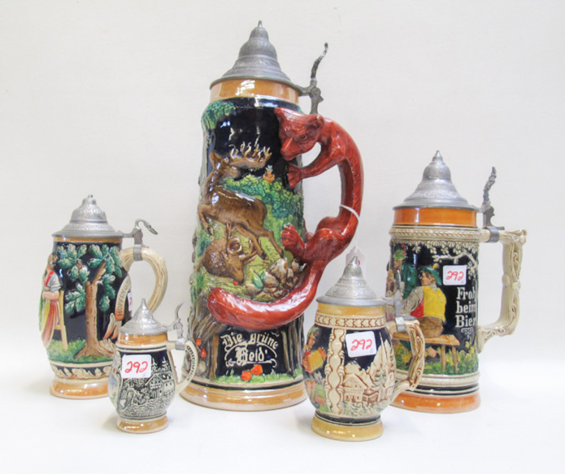 Appraisal: FIVE GERMAN STEINS each with polychrome glazes and pewter hinged