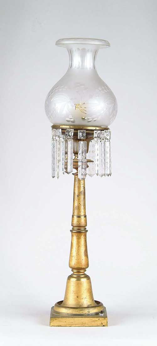 Appraisal: TALL ASTRAL LAMP Converted to electricity having a turned shaft