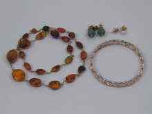 Appraisal: An amber necklace approx cm two pairs of earrings and