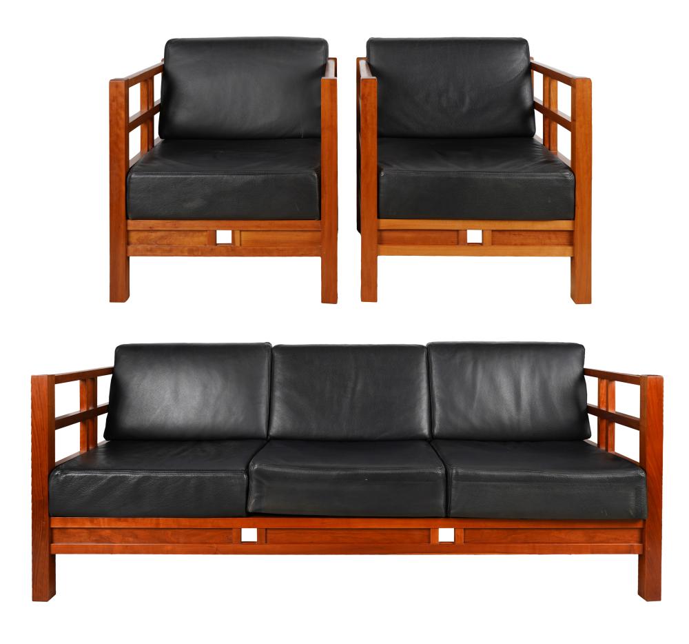 Appraisal: THOMAS MOSER WINDWARD SOFA TWO ARMCHAIRSstained wood with leather cushions