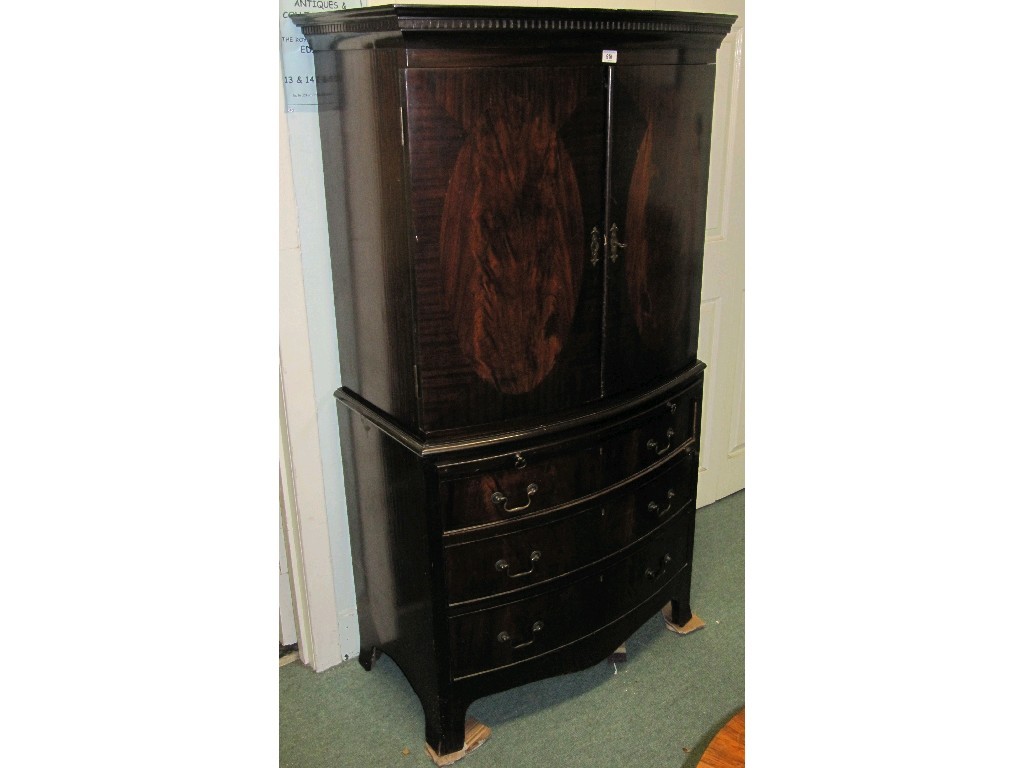 Appraisal: Mahogany bow fronted cabinet on chest