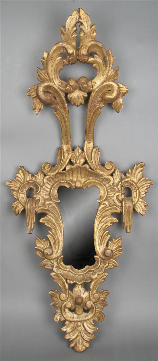 Appraisal: n Italian Rococo Style Carved Giltwood Mirror having pierce carved