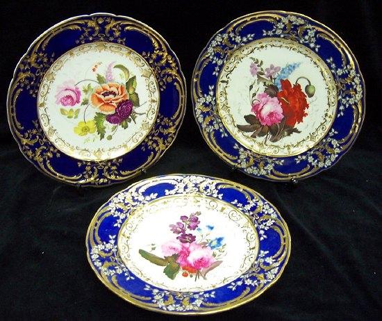 Appraisal: Three mid th Century Coalport plates each finely painted a