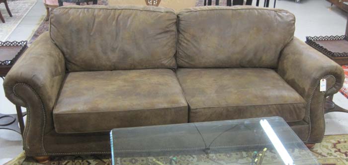 Appraisal: DARK BROWN SOFA Broyhill Furniture Co manufactured with overall dark