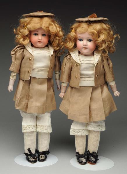 Appraisal: Lot Of German Bisque Dolls Each with bisque shoulder heads