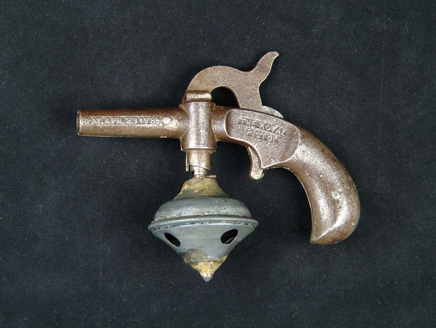 Appraisal: THE ROYAL PISTOL W TOP TOY CAP GUN AN Circa