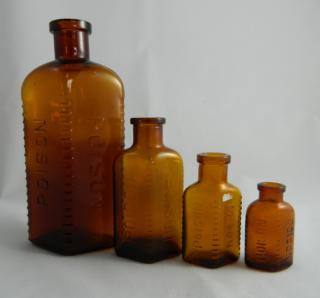 Appraisal: Amber poison bottles Poison- amber poison bottles three corners have