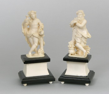 Appraisal: A Pair of Continental Carved Ivory Figurines on Pedestals A