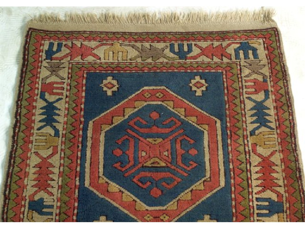 Appraisal: TURKISH RUG with two octagonal medallions m by m -