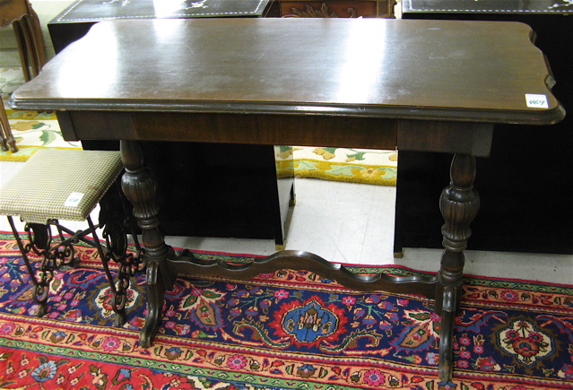 Appraisal: DARK MAHOGANY SOFA TABLE American c 's having a long